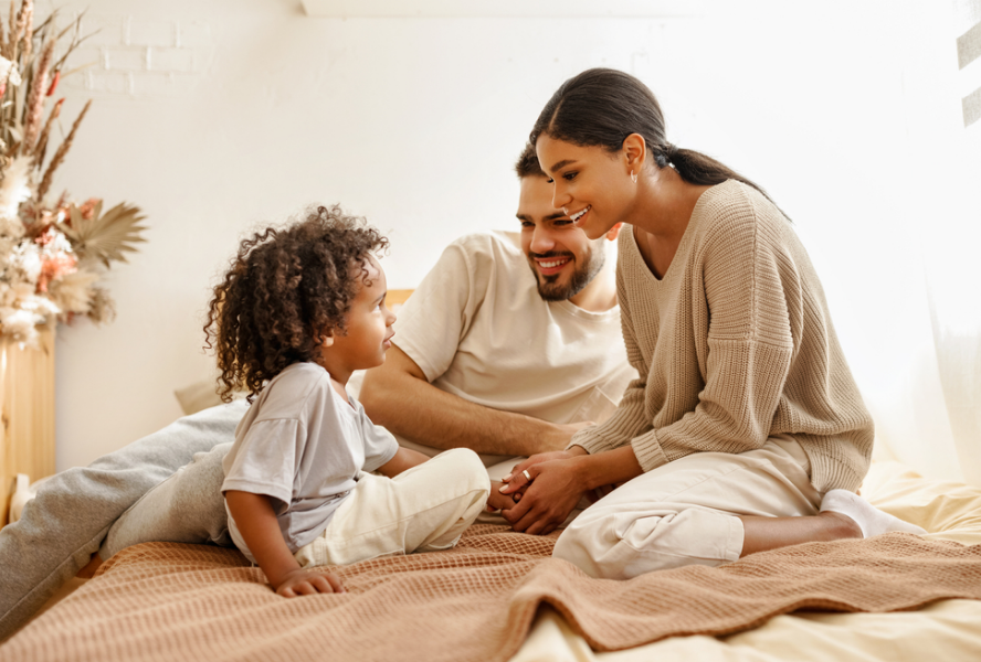 family sitting on a couch indoors